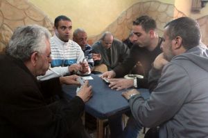 Arab customers play cards at Abu Salem's Coffee House in Nazareth. Photo by Flash90.